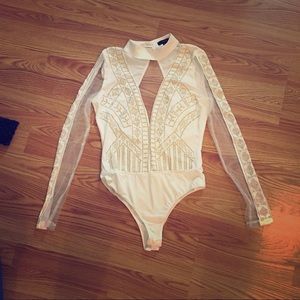 White mesh and beaded bodysuit